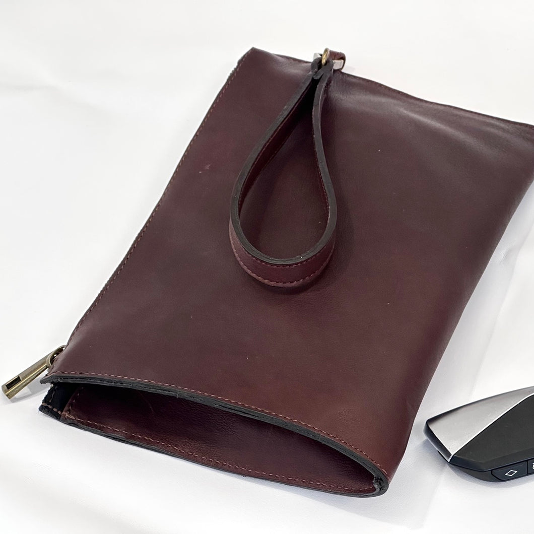 Borsa a mano slim da uomo in pelle
