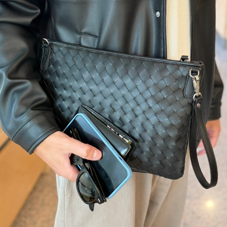 Pochette da polso in pelle intrecciata